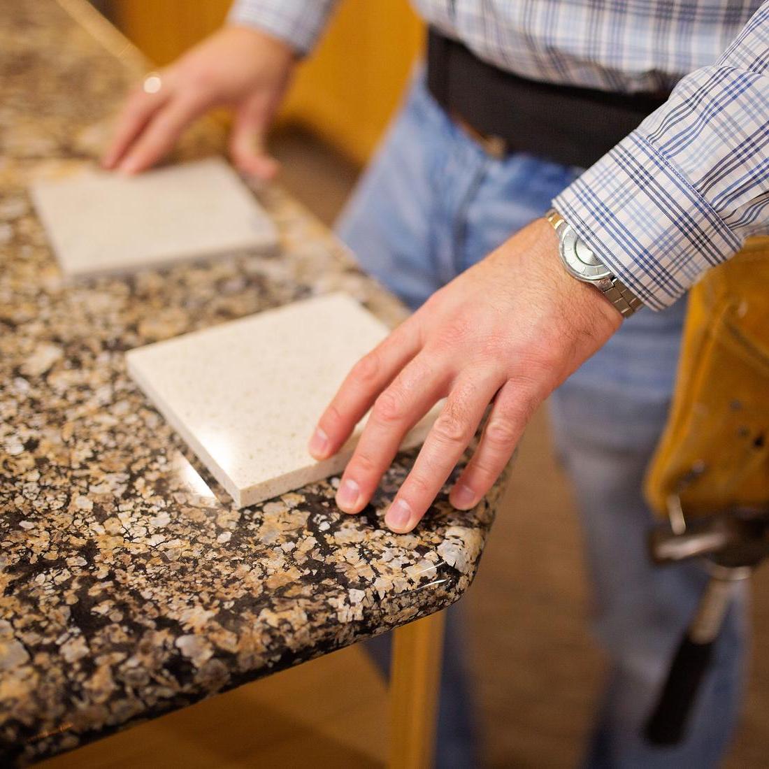 Granite samples on a countertop.